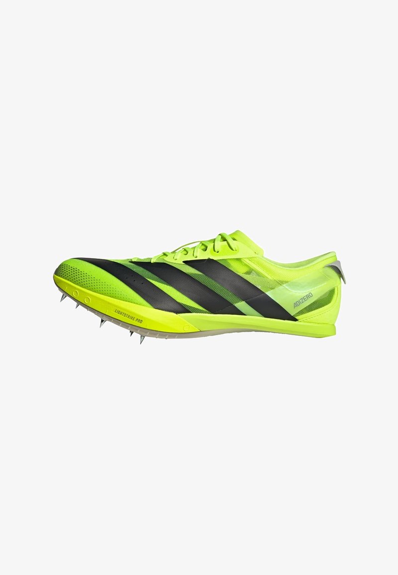 Chaussure de course à pointes Adidas Adizero vert néon et noir avec six pointes en métal sur la semelle, conçue pour la course sur piste.