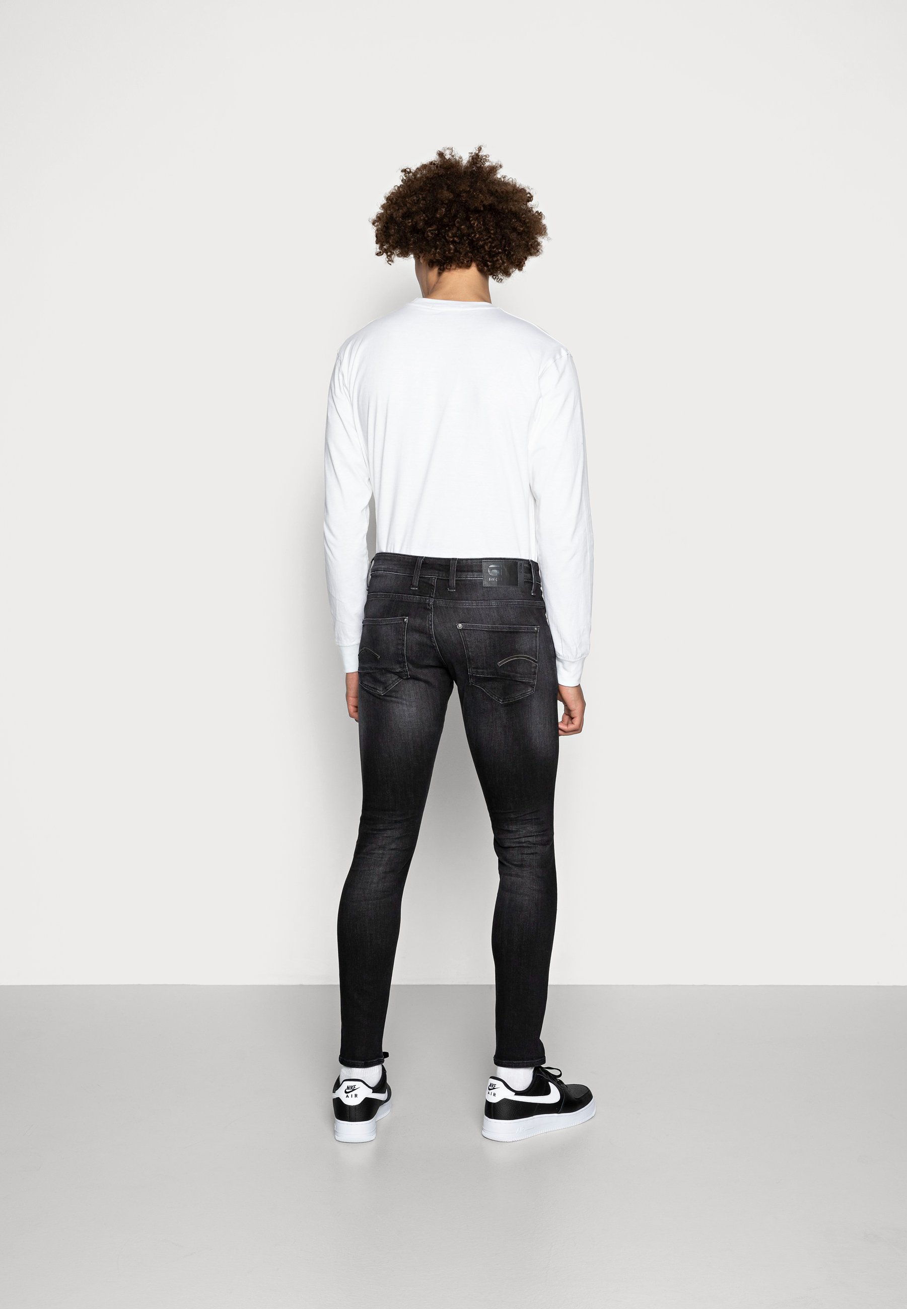 G-Star REVEND SKINNY - Prigludę džinsai - black denim/juodų džinsų - Zalando .lt