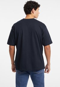 Guess Jeans VINTAGE - Marškinėliai su spaudiniu - schwarz