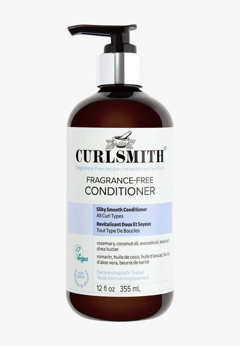 Dunkelbernsteinfarbene Flasche mit schwarzem Pumpkopf, beschriftet mit "Curlsmith Duftfreier Conditioner." Enthält weißen und hellblauen Text, 355 mL Füllmenge.