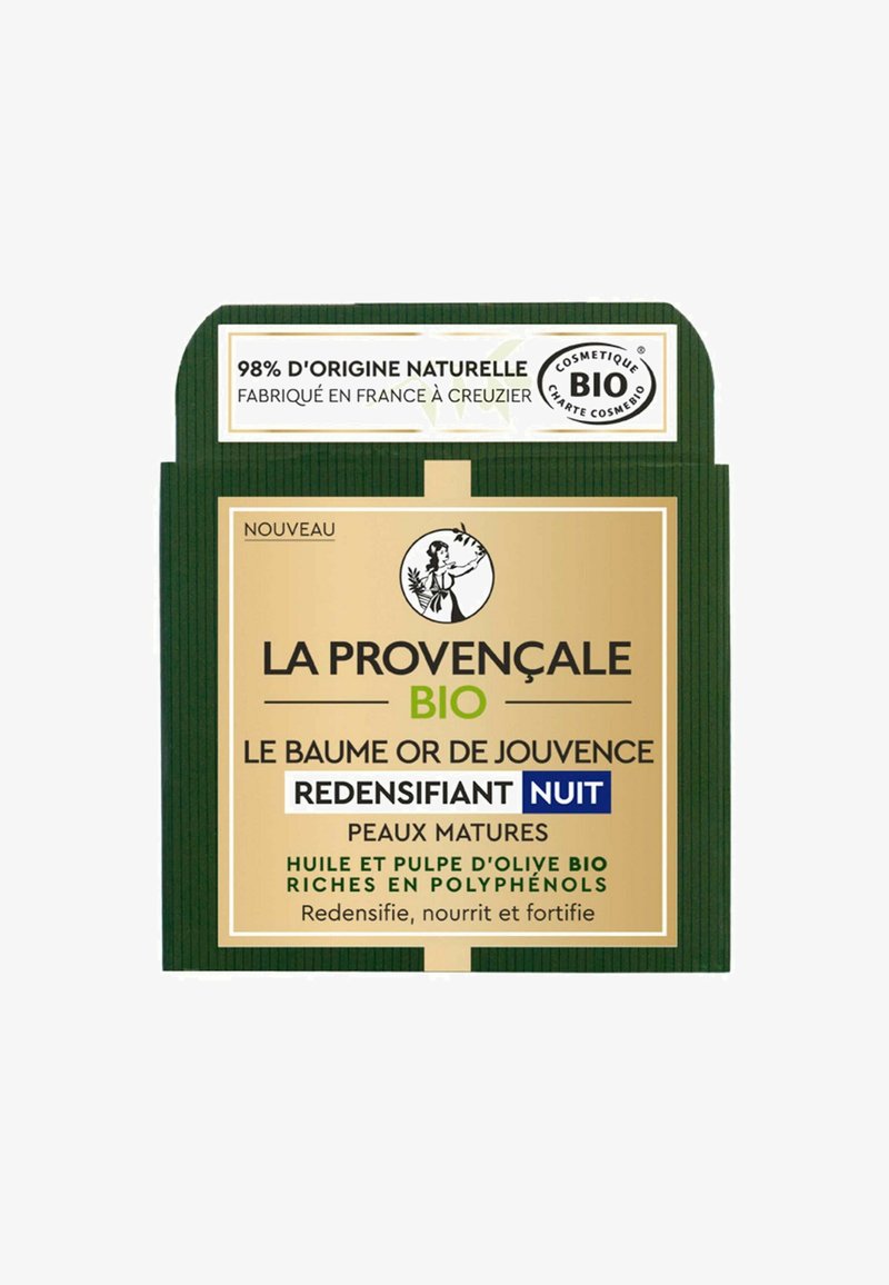 Emballage de couleur crème avec des rayures vertes, des accents dorés et du texte noir. Les étiquettes indiquent des ingrédients biologiques et une utilisation nocturne pour les peaux matures.
