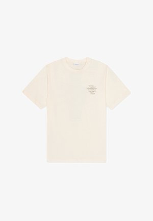 Kreemikas puuvillane lühikeste varrukatega T-särk. Esiküljel väike trükitud teksti kujundus. Ümmargune kaelus ja tavapärane lõige.