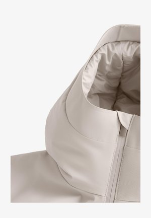Light beige hooded jacket featuring a smooth, waterproof outer material, visible zip closure, and a soft, padded interior lining.