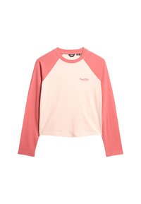 Raglan shirt met lange mouwen, koraalroze mouwen en kraag, lichtroze lijfje en een klein "SuperDry Athletics, CA." logo op de borst.
