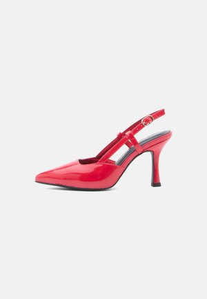 Punased patendiga nahast slingback baleriinid terava ninaga, millel on pandla ja stiilne konts. Sujuv ja läikiv viimistlus.