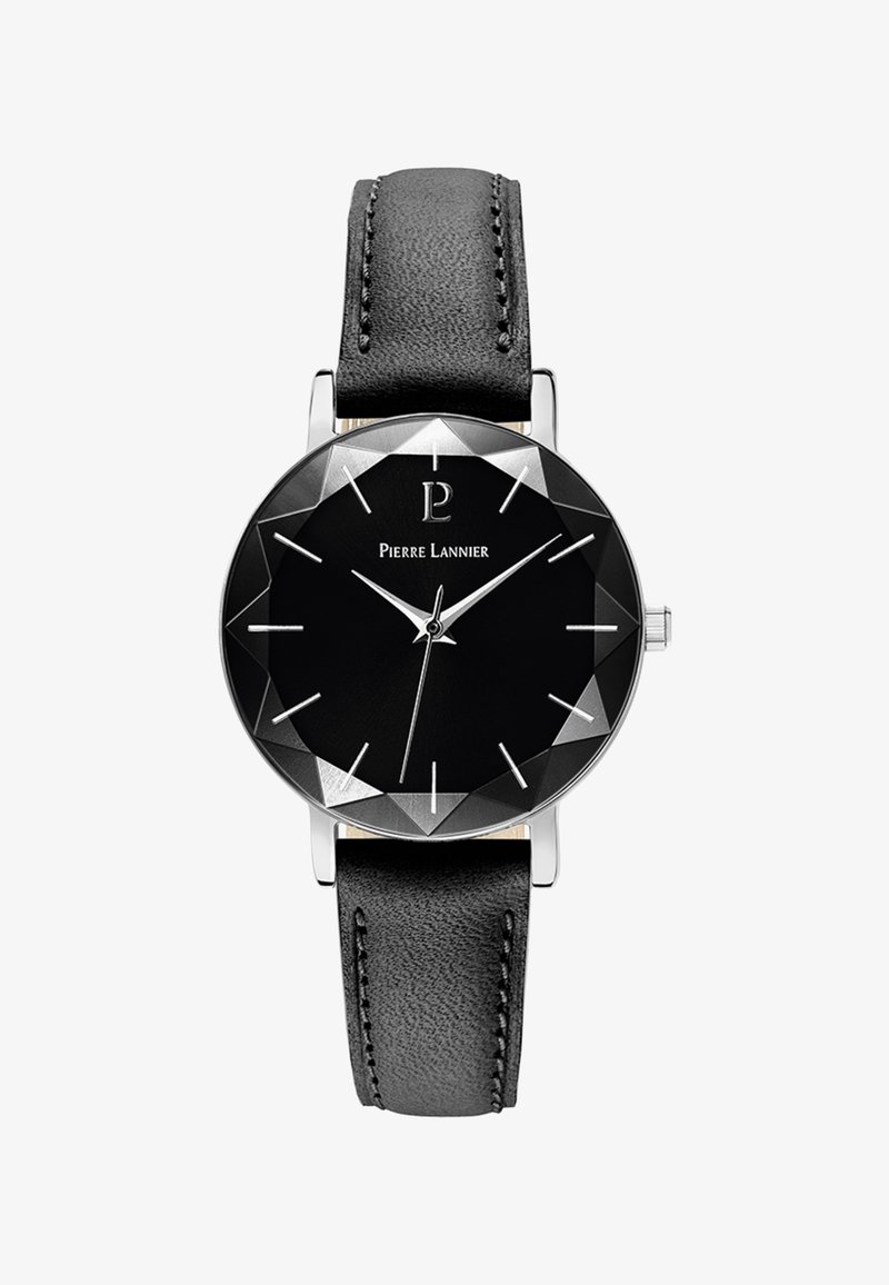 Apaļš melns pulkstenis ar facētām malām, sudraba rādītājiem un stundu atzīmēm. Iezīmē melnu ādas siksniņu ar dūriena detaļām.