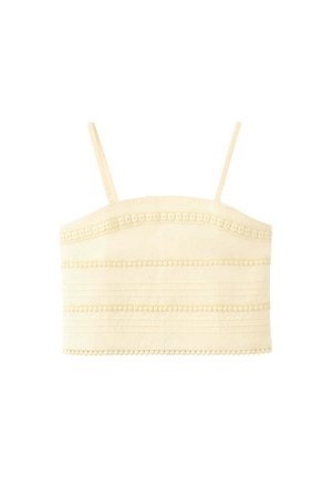 Caraco court couleur crème avec fines bretelles et détails décoratifs en dentelle horizontale et garniture à pompons.