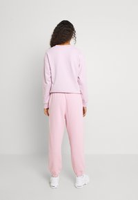 Levi's® PANTS - Trainingsbroek - winsome orchid