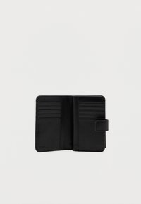 Black leather wallet with an interior featuring multiple card slots and a secure closure. Textured finish and minimalistic design.