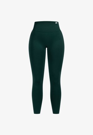 Ciemnozielone legginsy z wysokim, elastycznym pasem. Wykonane z gładkiego, elastycznego materiału, mają dopasowany krój i bezszwową konstrukcję.