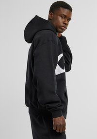 Karl Kani WAVY RETRO OS FULL - Sweatjakke - black