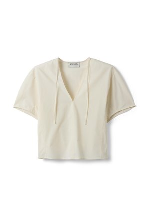 Offwhite Kurzarmbluse mit tiefem V-Ausschnitt und dünnen Bändern, aus glattem Stoff, mit Stefanel-Etikett im Kragen.