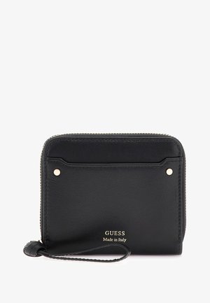 Black leather wallet with zipper closure, gold-tone hardware, a front card slot, and embossed brand logo, featuring a wrist strap.