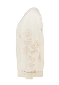 Crèmekleurige trui met opgeblazen mouwen, voorzien van een bloemenpatroon in beige pailletten aan één kant, en een aansluitende geribbelde zoom.