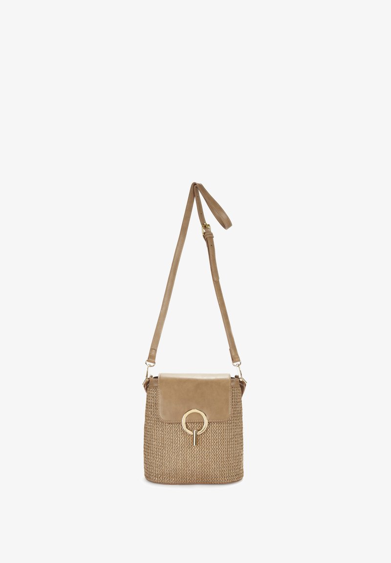 Tan crossbody bag with a woven texture and a smooth leather flap. Features a circular gold-tone hardware detail and adjustable strap.