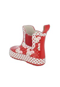 Botte en caoutchouc rouge avec des pois blancs et des motifs de souris. Panneaux latéraux élastiques, semelle texturée et languette pour un enfilage facile.