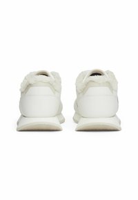 White athletic shoes with fluffy ankle collars, smooth synthetic material, and textured rubber soles. Minimalist design with a sleek silhouette.