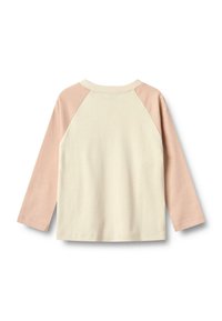 Langärmliges T-Shirt mit einem cremefarbenen Körper und sanft rosa Raglanärmeln, aus Baumwolle gefertigt. Verfügt über einen Rundhalsausschnitt und eine lässige Passform.