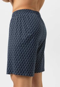 Marineblauwe korte broek met een herhalend wit omrissingspatroon van olifanten, met een elastische tailleband en een ontspannen pasvorm.