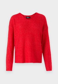 Suéter de punto rojo con cuello en V, mangas largas y textura acanalada. Cuenta con un ajuste holgado y una marca minimalista en el cuello.