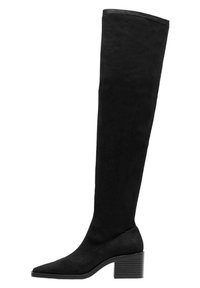 Bottes noires en suède souple, montantes jusqu'au genou, avec un bout pointu et un talon épais à détail strié.