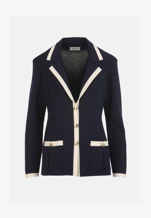 Tumši zils kardigans ar krēmkrāsas apmali, pogām un kabatām. Tam ir atloks apkakle un pieguļošs siluets, izgatavots no mīksta trikotāžas materiāla.