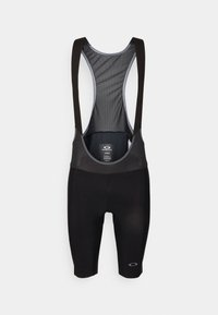 Shorts de vélo noirs avec bretelles en mesh, arborant un accent logo et un design ajusté. Fabriqués en matériau léger et respirant.
