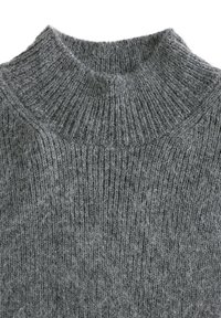 Gray knitted sweater featuring a high ribbed collar, fine texture, and a soft, fuzzy finish with variation in gray tones.
