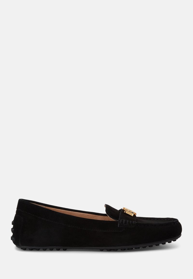Black suede loafer with a rounded toe, featuring a decorative gold-tone hardware accent and rubber sole with grip pattern.