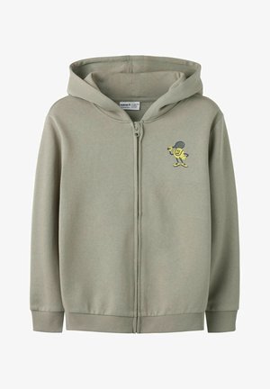 Felpa con cappuccio e zip in tessuto verde chiaro, con un design di un personaggio animato giallo sul petto a sinistra, con polsini e orlo a coste.