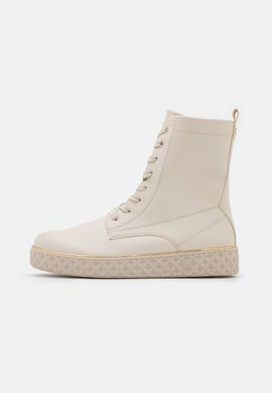 Bottines à plateau - off-white