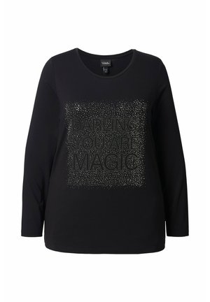 T-shirt nero a maniche lunghe caratterizzato da una grafica in strass testurizzati che recita "CARA, SEI MAGIA" centrata sul davanti in lettere in grassetto.
