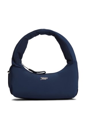 Geantă bleumarin căptușită, cu mâner curbat și buzunar frontal cu fermoar, având logo-ul alb „tommy jeans” în partea frontală centrală.