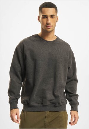 Dark gray sweatshirt with a crew neck, long sleeves, and ribbed cuffs and hem. Made of soft fabric, featuring a relaxed fit and minimal detailing.