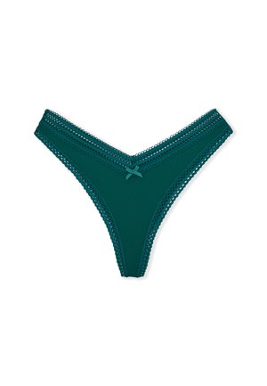 String en dentelle teal avec un design en V, en matériau ribbé texturé et un petit nœud accent au devant. Finitions délicates et compliquées.
