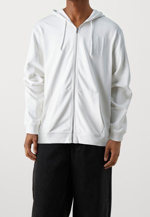 Vetoketjullinen college - beige