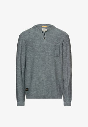 Grå langærmet henley-shirt med tre sorte knapper, brystlomme, ribbede manchetter og tekstureret strikket stof.