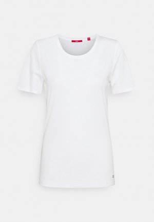 T-shirt blanc à manches courtes en coton. Présente un col rond et un petit détail d'accent à l'ourlet. Design simple et texture lisse.