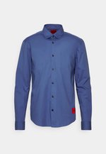 HUGO - Acquista la collezione da uomo su