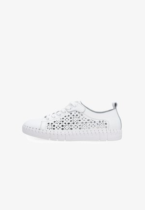 White casual sneaker with lace-up front and floral cutout patterns on the side, featuring a flexible, segmented sole and pull tab at the heel.