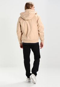 Urban Classics HEAVY HOODED JACKET - Chaqueta de entretiempo - beige