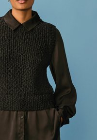 Next Striktrøje - black