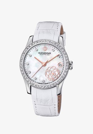 Montre-bracelet à bracelet en cuir blanc avec lunette ornée de cristaux, cadran en nacre, aiguilles en or rose, motif floral et affichage de la date à 3 heures.