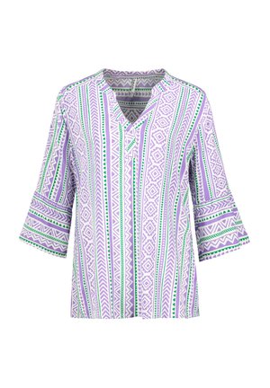 Lila Tunika-Oberteil mit grünen und weißen geometrischen Mustern, V-Ausschnitt und 3/4-langen Bischofärmeln. Glattes Material mit strukturiertem Schnitt.