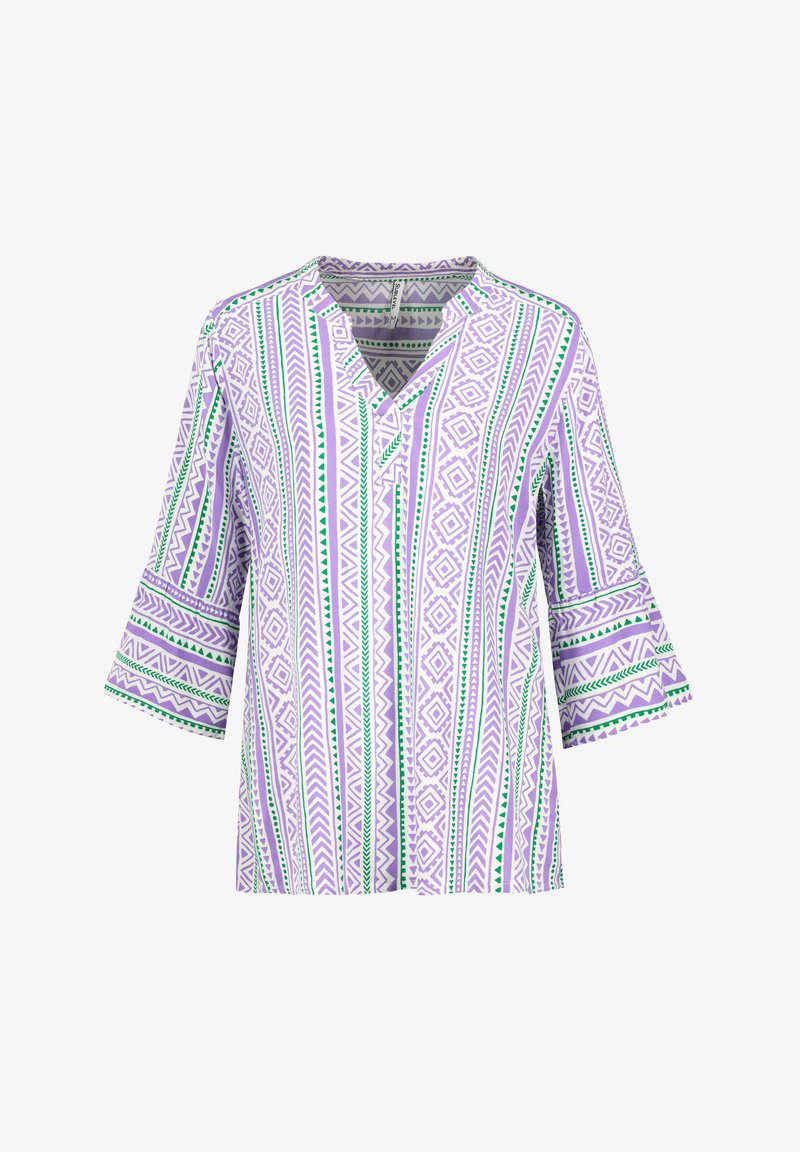 Lila Tunika-Oberteil mit grünen und weißen geometrischen Mustern, V-Ausschnitt und 3/4-langen Bischofärmeln. Glattes Material mit strukturiertem Schnitt.