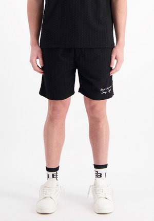 Black Bananas Tracksuit bottoms - black