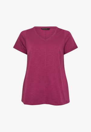 Kortærmet, V-hals, magenta kvindes T-shirt med en central søm ned foran, vist på hvid baggrund.