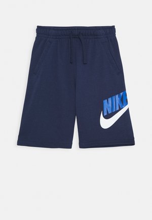 Mørkeblå Nike-shorts med elastisk taljebånd, snøre, sidelommer og stort blåt og hvidt Nike-logo på venstre ben.