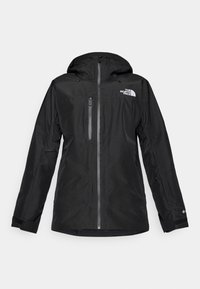 Schwarze wasserdichte Jacke mit Kapuze, Frontreißverschluss, zwei Reißverschlusstaschen und verstellbaren Manschetten. Logo auf der oberen linken Seite.