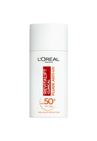 Solaire Revitalift Clinical de L'Oréal dans un flacon blanc avec une étiquette orange. Contient un SPF 50+, conçu pour une protection élevée contre les UV.